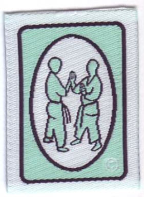 pushing hands badge